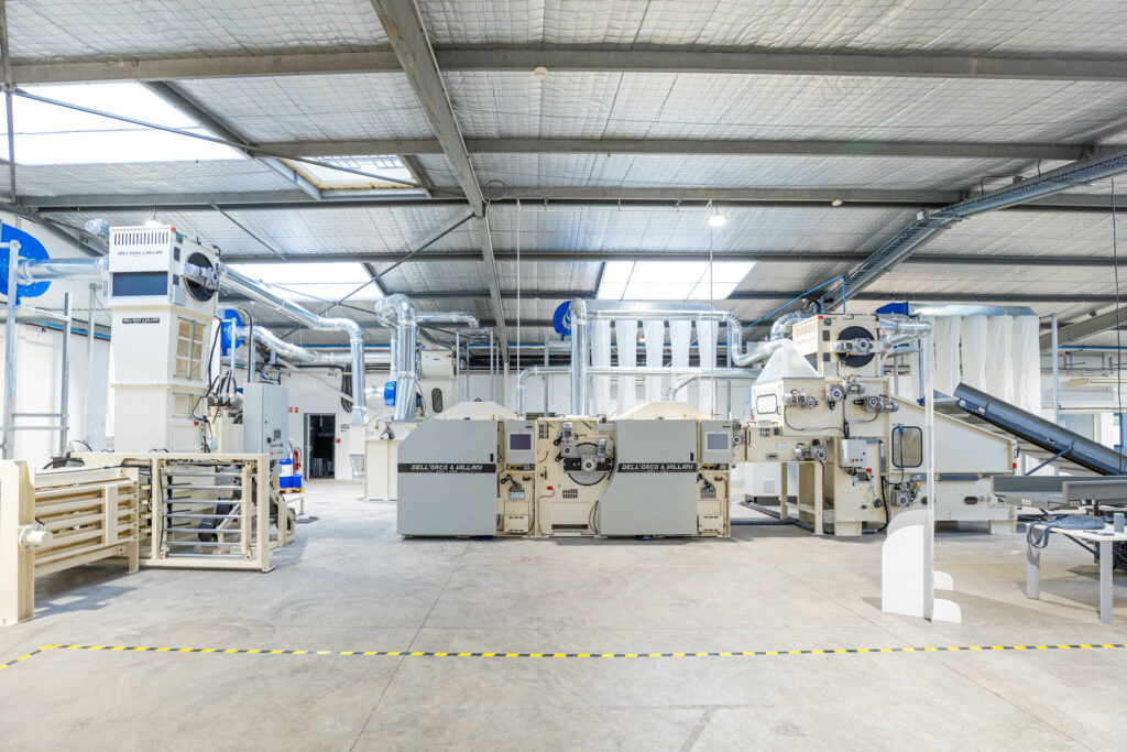 Ligne industrielle de délissage textile Dell’Orco & Villani opérée par le CETIA pour la préparation matière avant recyclage